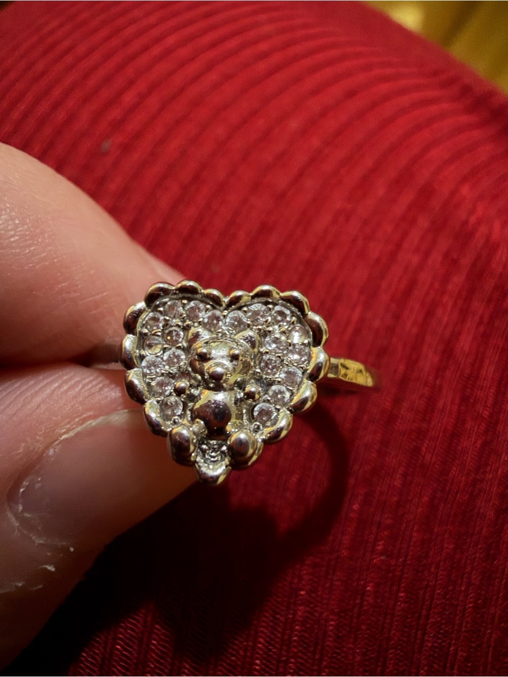 Silver heart ring with teddy bear inside the heart. Adjustable